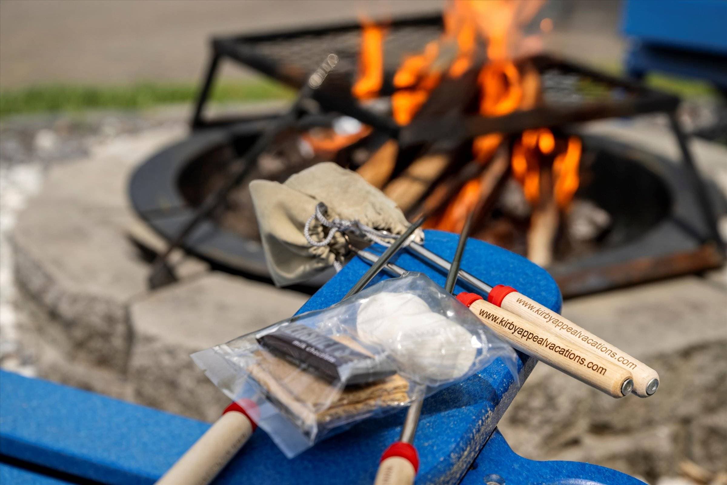 Gather around the fire pit that seats four, perfect for cozy evenings, storytelling, and making s'mores with our complimentary s'mores kit!