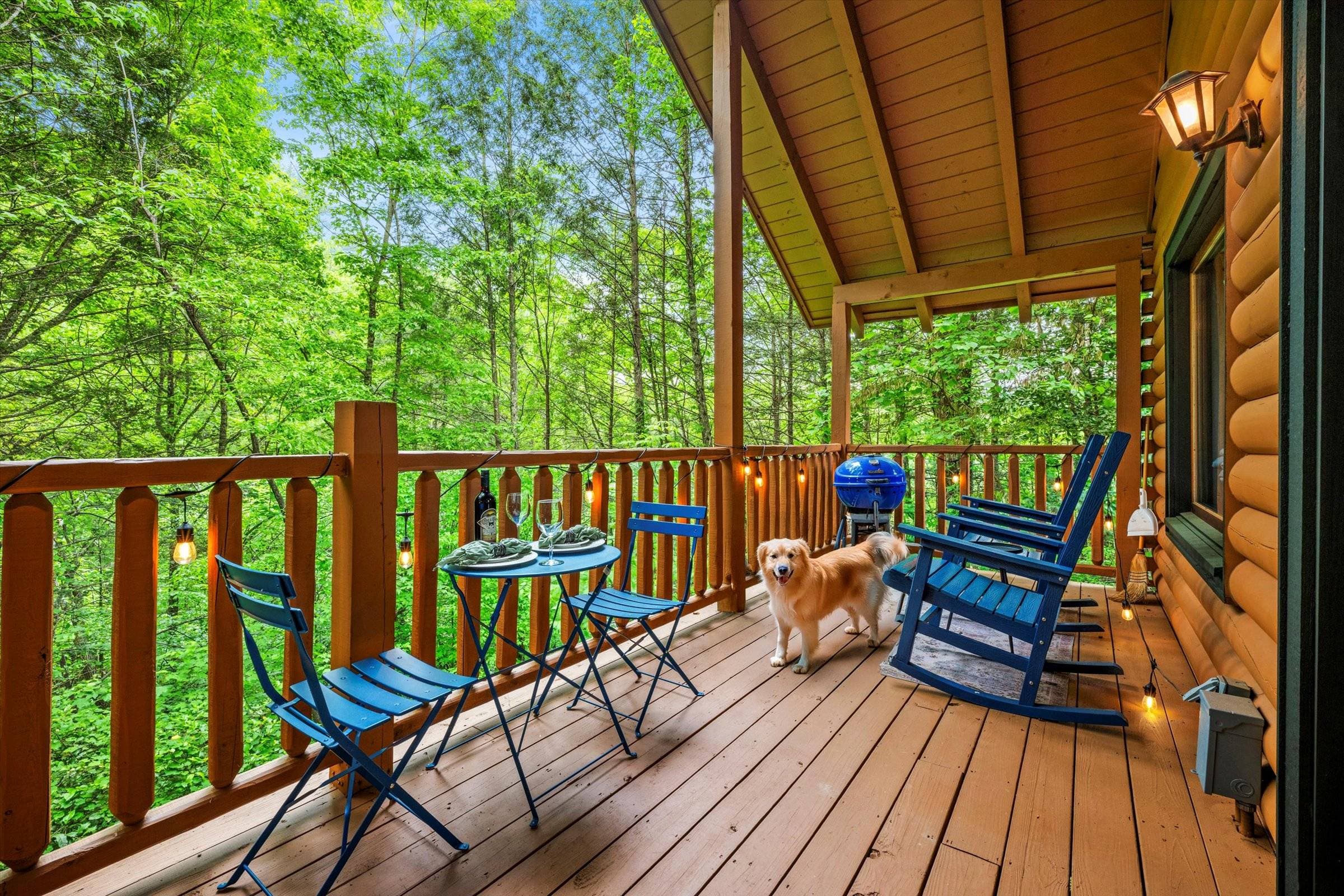 Relax on the private deck with bistro table, rocking chairs, charcoal grill, and string lights—perfect for romantic dinners, morning coffee, or cozy evenings under the stars!